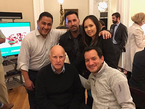 Frankie Guzman, left, with Scott Budnick, Anthony Rendon, and California Gov. Jerry Brown