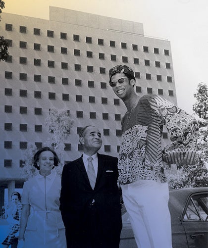 From left: Ruth Bunche, Ralph Bunche, and Kareem Abdul-Jabbar, standing in front of Bunche Hall