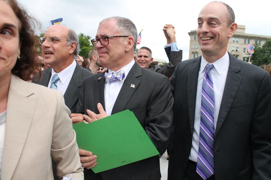 James Obergefell (foreground, center, wearing a flag pin) and attorney Al Gerhardstein (foreground, left). Photo by Elvert Barnes/Flickr
