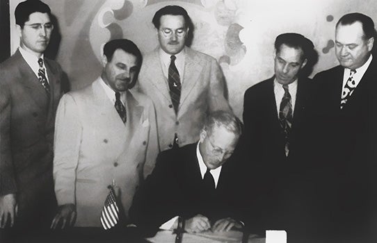 California Gov. Earl Warren signs the bill that creates UCLA School of Law in 1947