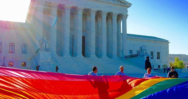 Pride flag in front of the US Supreme Court building.  Photo: Jordan Uhl/Flickr