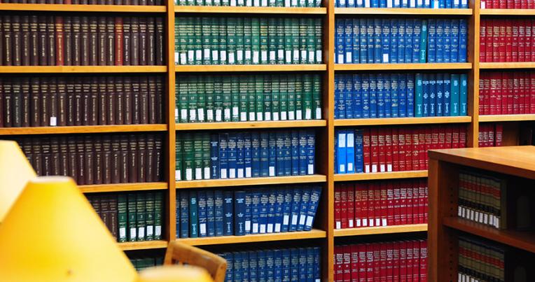 Books on shelves in the UCLA Law Library