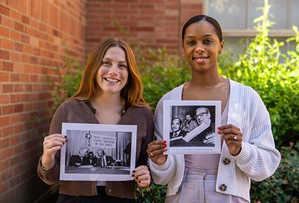 Left to right: Kitty Young and Evan Mitchell Zepeda hold photos of their relatives, civil rights icons Joseph L. Rauh Jr. and Clarence M. Mitchell Jr.
