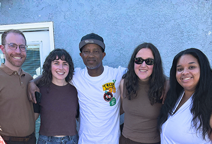 Joseph Turner (center) with Resentencing Practicum program director Josh Weiss and students Cathy Balfe ’26, Tori Funk ’26, and Destinee Dickson ’26.