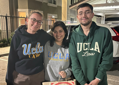(L-R): Students Jessie Rich, Alexandra Sarkis, and Camilo Suárez prepare to welcome their client home. Photo courtesy of CILP.