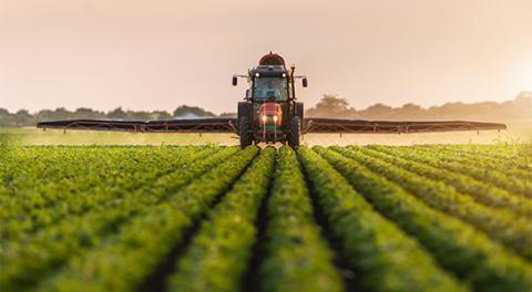 tracker in field of crops